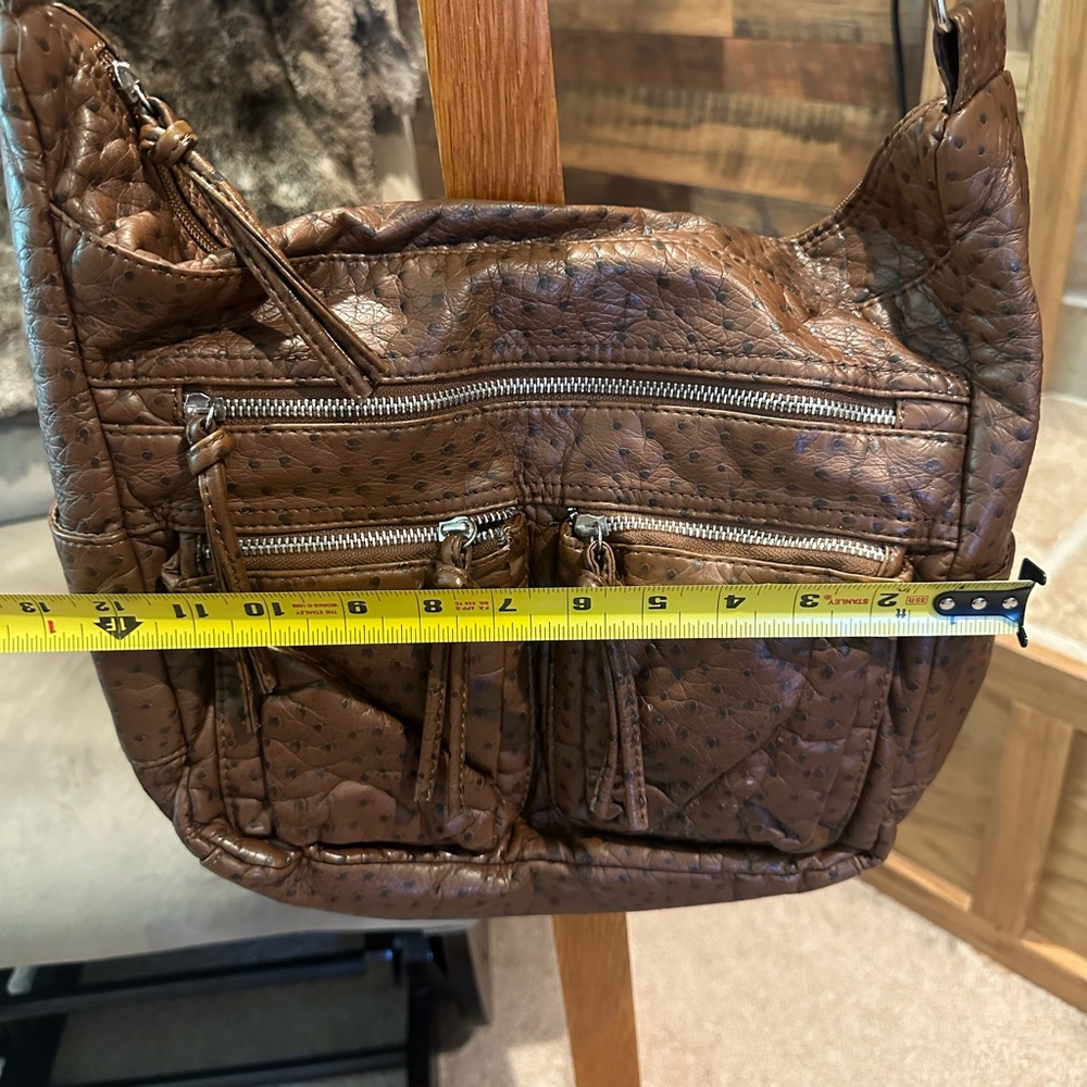 Soft faux leather purse. Ostrich print. Great condition. Adjustable strap. - Picture 6 of 7